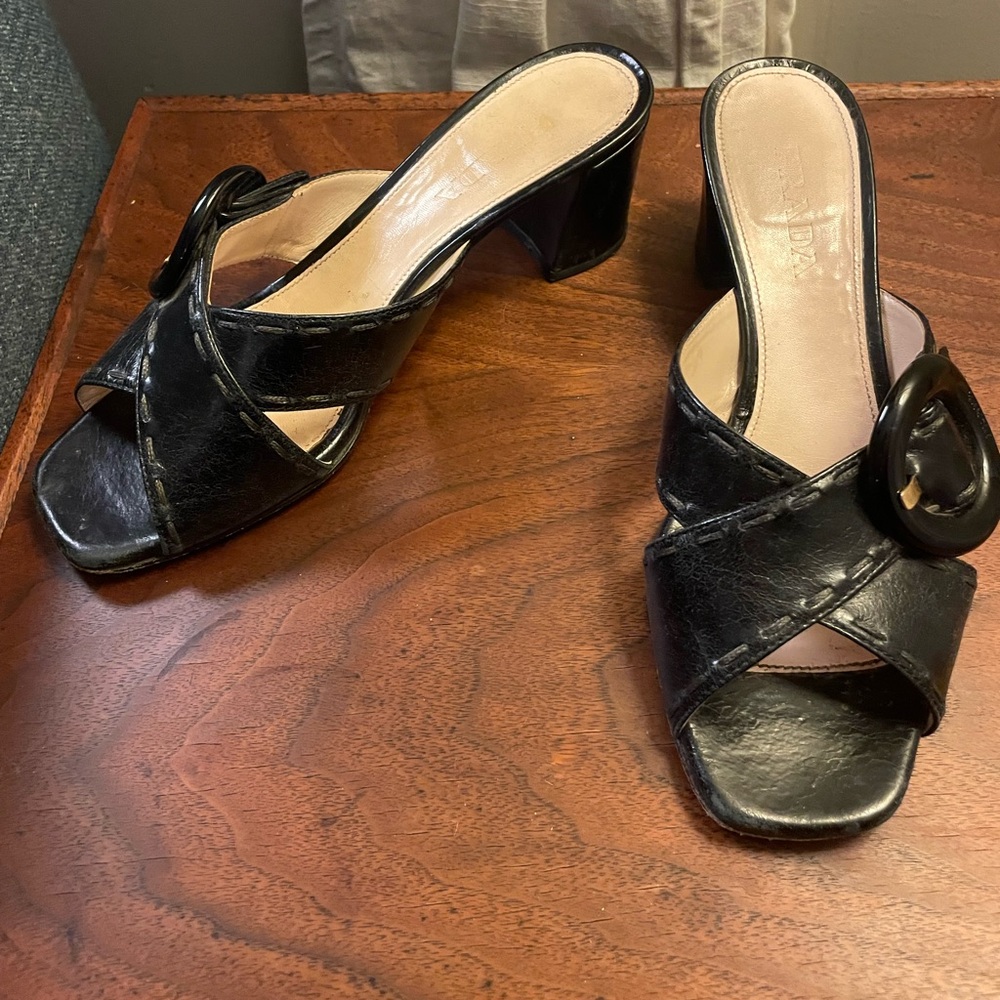Prada Black Leather Slide Heeled Mules with Oversized Buckle